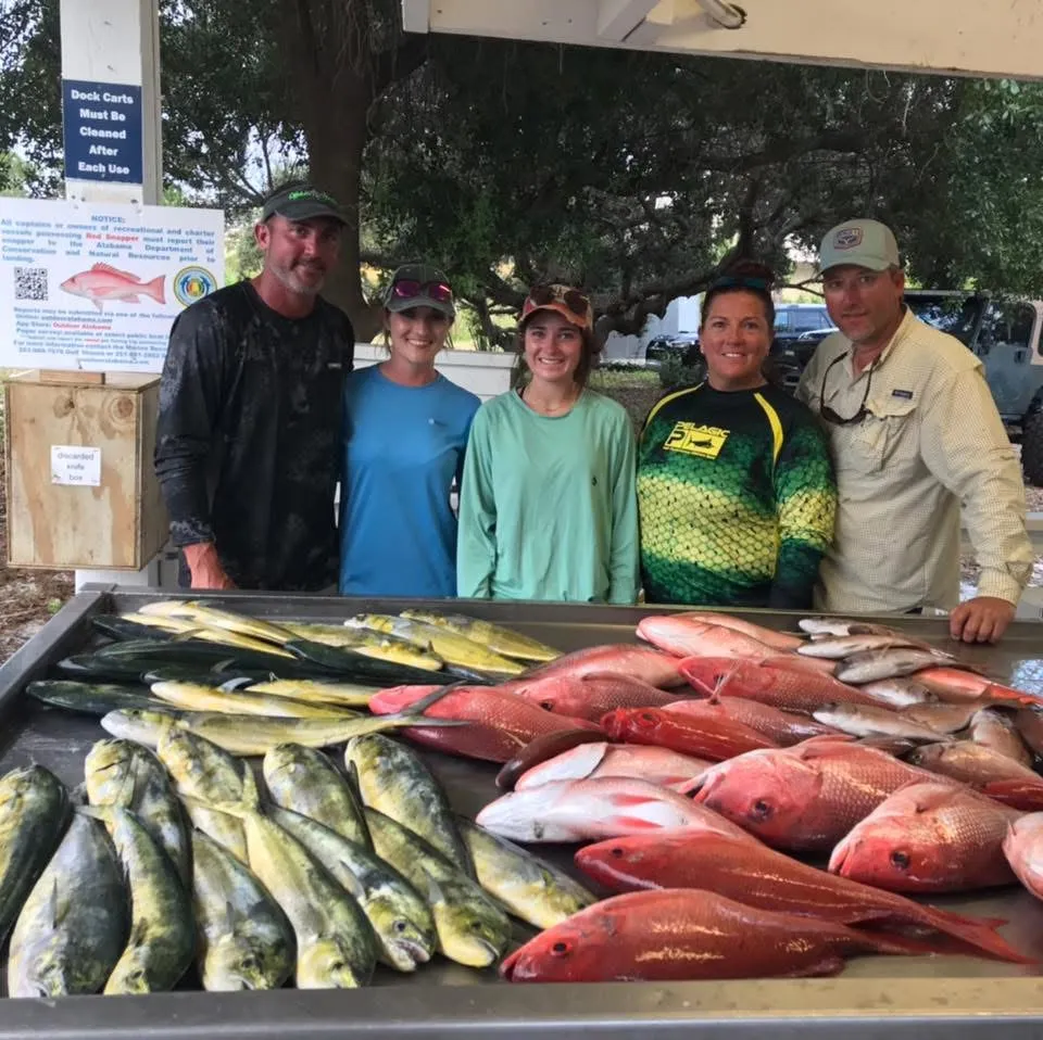 Full table of fish after 10-hour deep sea fishing trip Orange Beach Alabama